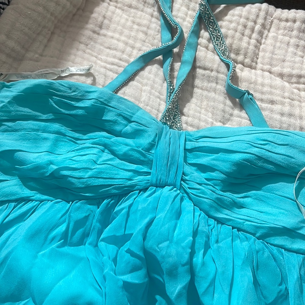 Betsy Johnson dress. Teal new, never work. Needs buttons. Easy.